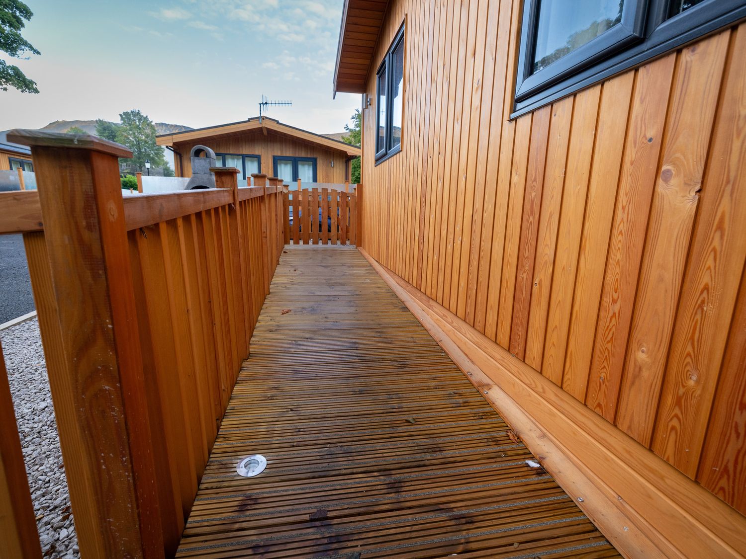 Dovestone Spa Accessible (Lodge 12), Greenfield, Greater Manchester. Ramps. Sunken hot tub. Barbecue