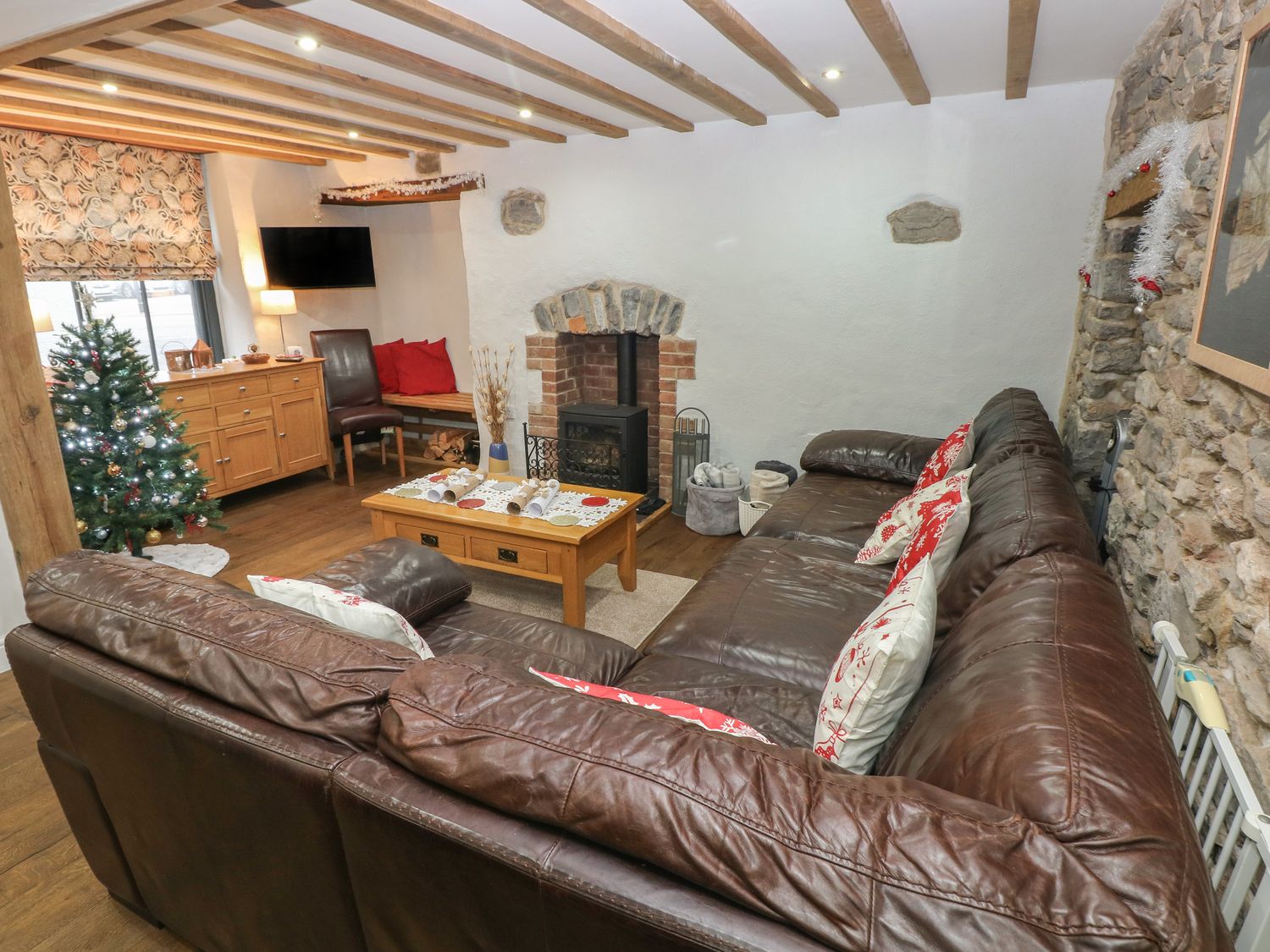 Blacksmiths Cottage rests in Pembrokeshire. Pet-friendly. Hot tub. Cinema room. Woodburning stove.