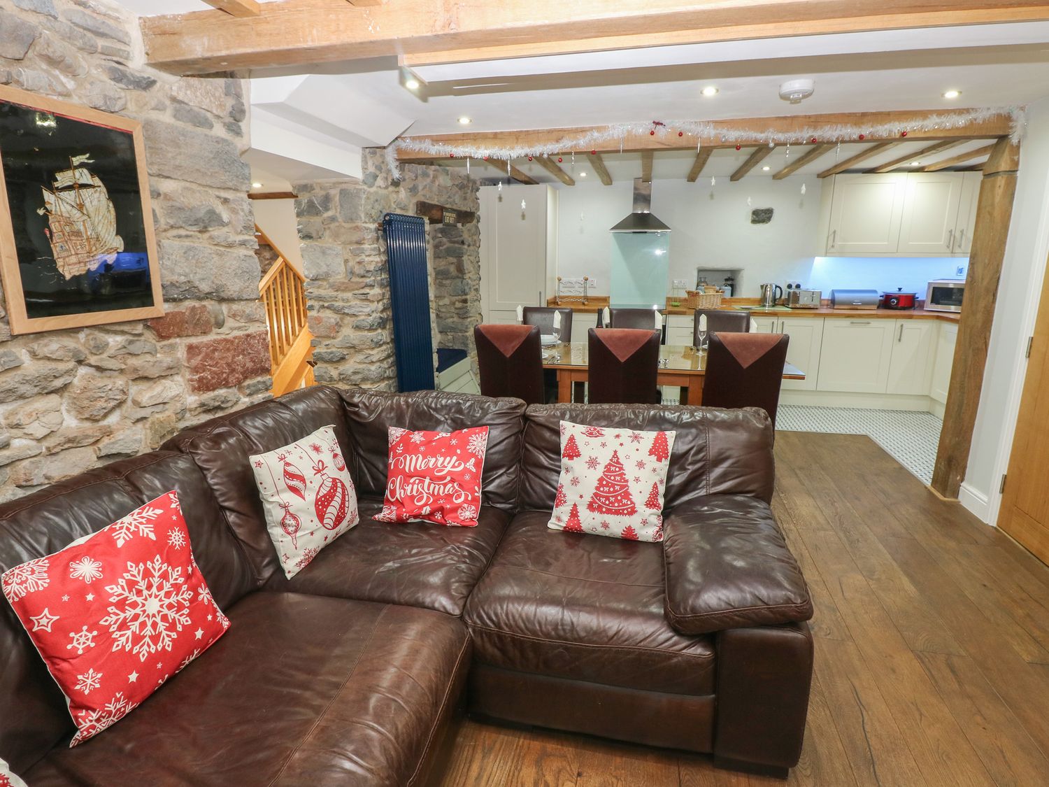 Blacksmiths Cottage rests in Pembrokeshire. Pet-friendly. Hot tub. Cinema room. Woodburning stove.