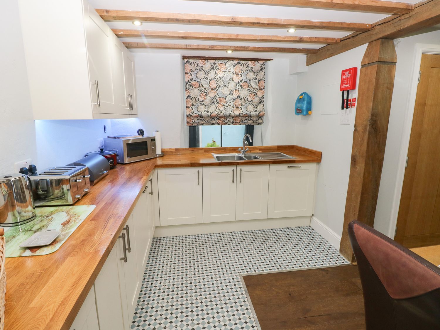 Blacksmiths Cottage rests in Pembrokeshire. Pet-friendly. Hot tub. Cinema room. Woodburning stove.