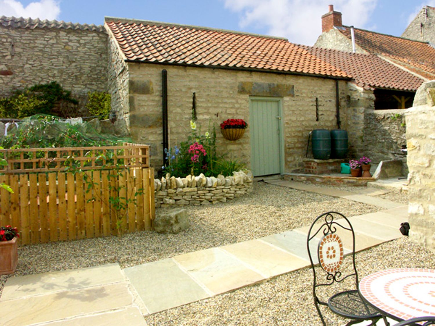 Courtyard Courtyard at Cow Byre Cottage ( Ref 1577 ) Wrelton Holiday Property rental sleeps 2 near Pickering North Yorkshire