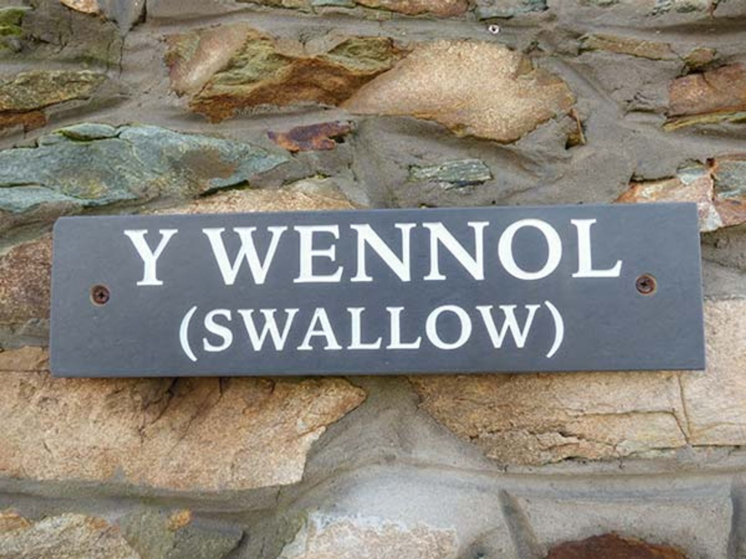 Y Wennol, Wales