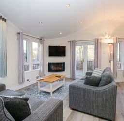 A living room with a sofa and coffee table at Heights View