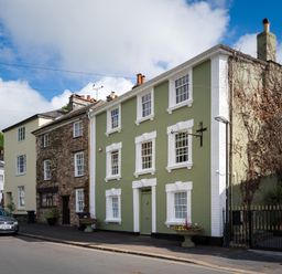 A house with windows and plants on the street at The Meeting House in Ashburton