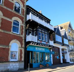 A street view showing a row of buildings including the Rockfish seafood restaurant at 2 Embankment House in Dartmouth