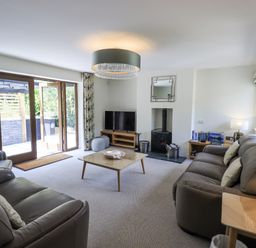 A living room with a coffee table and sofa at No 7 Ambleside