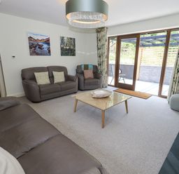 A living room with sofas and a coffee table at No 7 in Ambleside