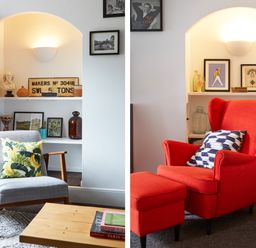 A seating area with a gray armchair and a wooden coffee table with books and a red wingback chair with an ottoman and cushions at 1 Pringles Yard in Alnwick