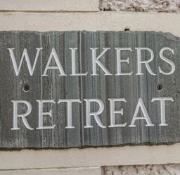 A sign with the text Walkers Retreat at Walkers Retreat in Keswick