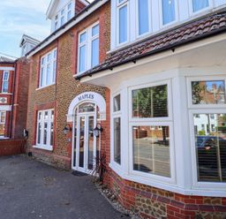 A building exterior with an entrance at Maples in Hunstanton