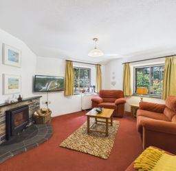 A living room with two sofas and a coffee table at The Roundhouse in Warbstow