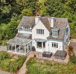A house with a conservatory and garden at Afallon in Menai Bridge