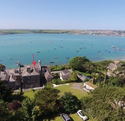 A coastal view with boats on the water and houses on the shore at 4 The Terrace in Rock