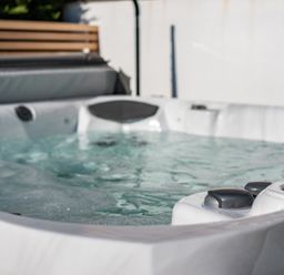 A close up of a hot tub filled with water outdoors at Seastar in Rock