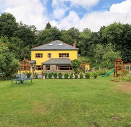 A house with garden and playground at The Woodlands Lower Level in Stepaside
