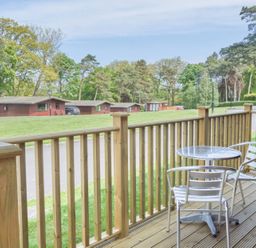 An outdoor area with a table and chairs at Lavender Lodge in Saltburn-By-The-Sea
