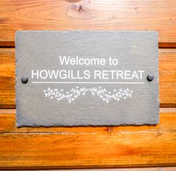A welcome sign at Howgills Retreat Gatebeck near Kirkby Lonsdale