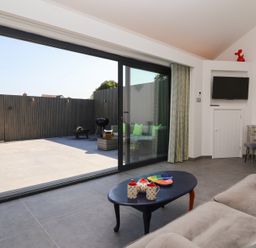 A living room with a view of the terrace at Ninky Nonk in Bristol