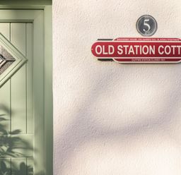A door and nameplate at Old Station Cottage in Blaenau Ffestiniog