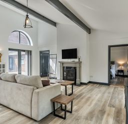 A living room with a sofa and coffee table at The Annex in Wimborne Minster