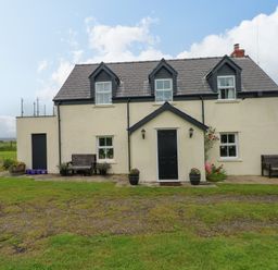 An exterior view of a cottage at North Studdock Cottage in Angle near Pembroke