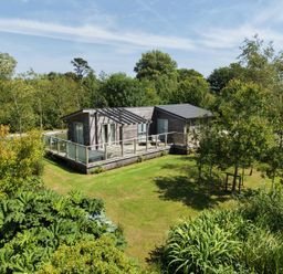 A house with a deck and garden at 6 Southern Place in Dobwalls