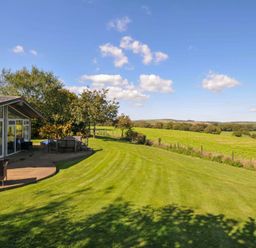 A garden with furniture and a view at 8 Horizon View in Dobwalls