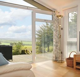 A living room with a view of the outdoors at 11 Horizon View in Dobwalls