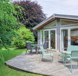 An outdoor seating area with chairs and a table at 15 Horizon View in Dobwalls
