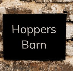 A sign displaying Hoppers Barn at Hoppers Barn near Pancrasweek near Holsworthy