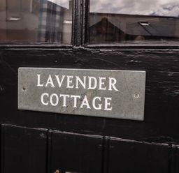 A nameplate on the door of Lavender Cottage in Alnwick