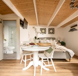 A studio room with a table and chairs at Hazel in Blandford Forum