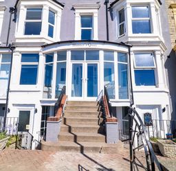 The entrance with stairs and windows at Apt 3 @ Hunter's Quay in Bridlington