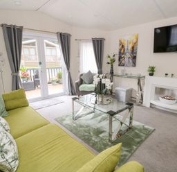 A living room with a sofa and coffee table at The Haven in 