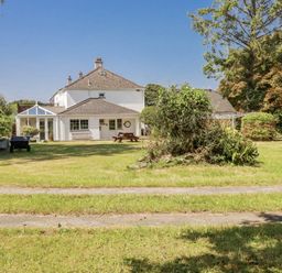 A house with a garden and a pathway at Temple House in Goonhavern
