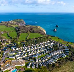 An aerial view of a holiday park by the sea at Lodge 15 at Landscove Holiday Park Brixham