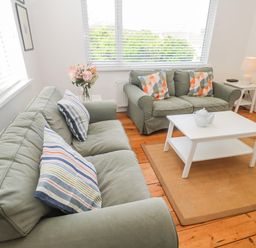 A living room with sofas and a coffee table at Bod A Quinte in Carbis Bay