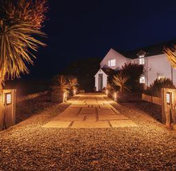 A pathway leading to a house at Glanllyn Bach in Llanfaelog