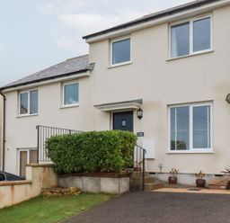 A house with steps and plants at Blissful Ocean Breeze in Perranporth