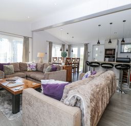 A living room with sofas and a coffee table at Angel Lodge - No 27 Fornham St Genevieve near Bury St Edmunds