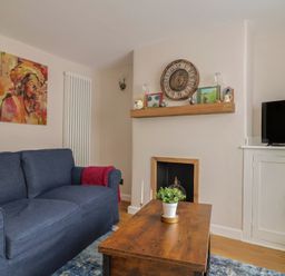 A living room with a sofa and coffee table at 6 Bedford Place in Bridport