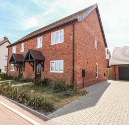 A house with a garage and garden in Shotley Gate