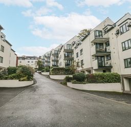 An outdoor view of buildings and a road at Claife Flights in Bowness-On-Windermere