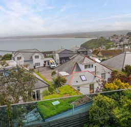 A view of houses and the sea at Miramar in St. Ives