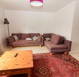 A living room with sofas and a coffee table at Shanti Gher in Bantry