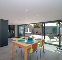 A dining room with a table and chairs at Number 7 in Bishop Sutton