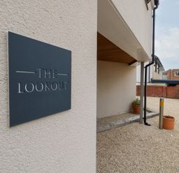 The entrance area with a sign at The Lookout in Wyke Regis