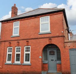 A brick house with multiple windows and a door at 59 Moorland Road Scarborough
