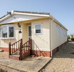 A house with steps and a pathway at Lazy Days in St Merryn