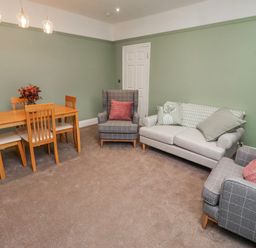 A living room with a dining area at 3 Lisburn Street Alnwick